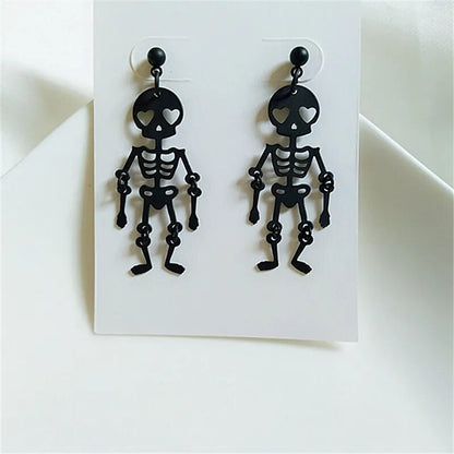 Boucles d'oreilles squelettes spécialement conçues pour les femmes.